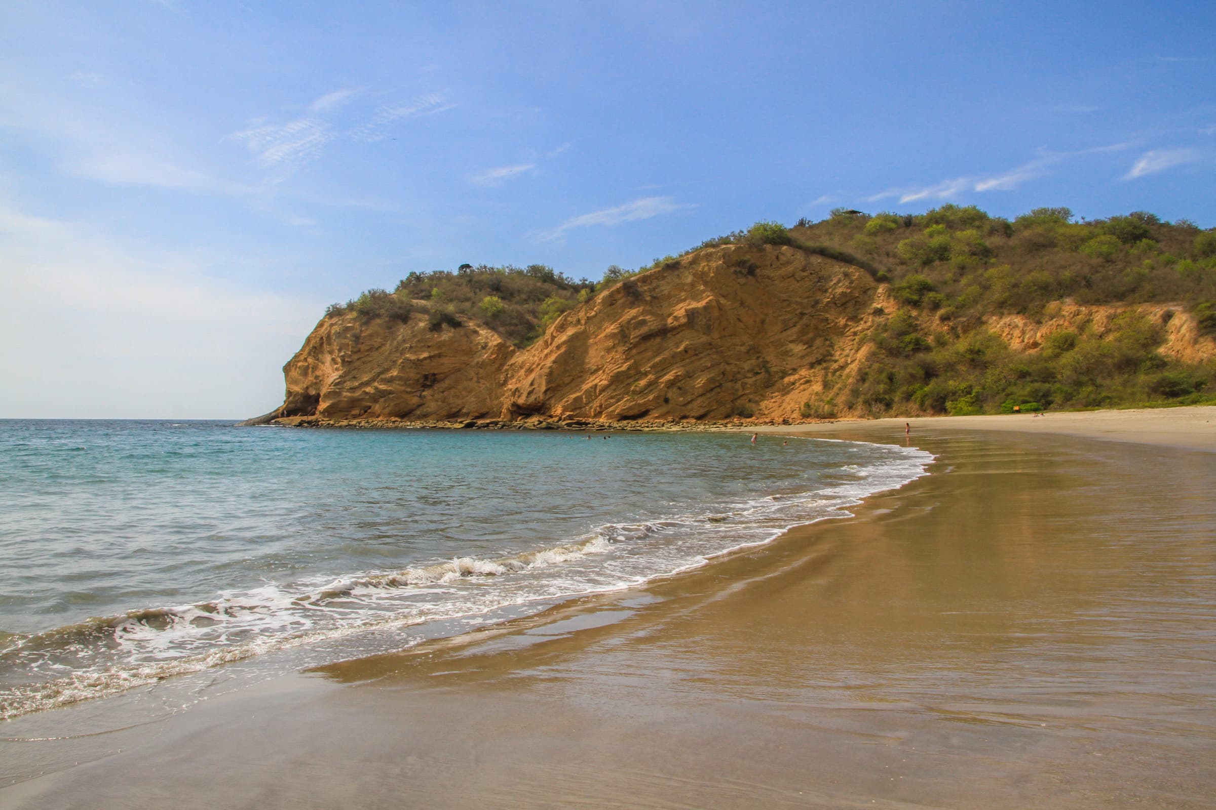 Beach and local coastal rhythm in Puerto López, Ecuador